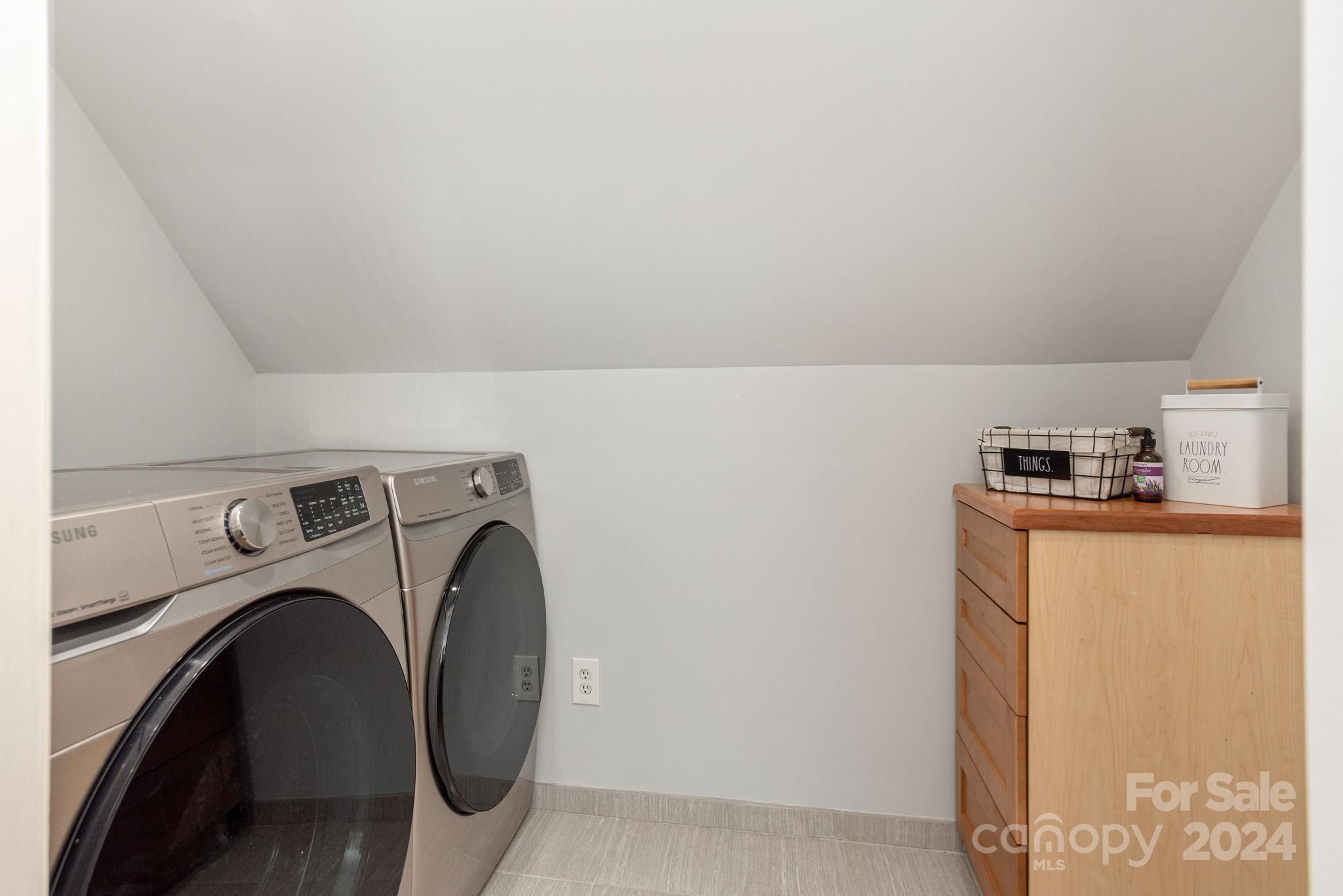 21 Spring Cove Court Arden, NC 28704 - Photo 24 of 32 a utility room with dryer and washer