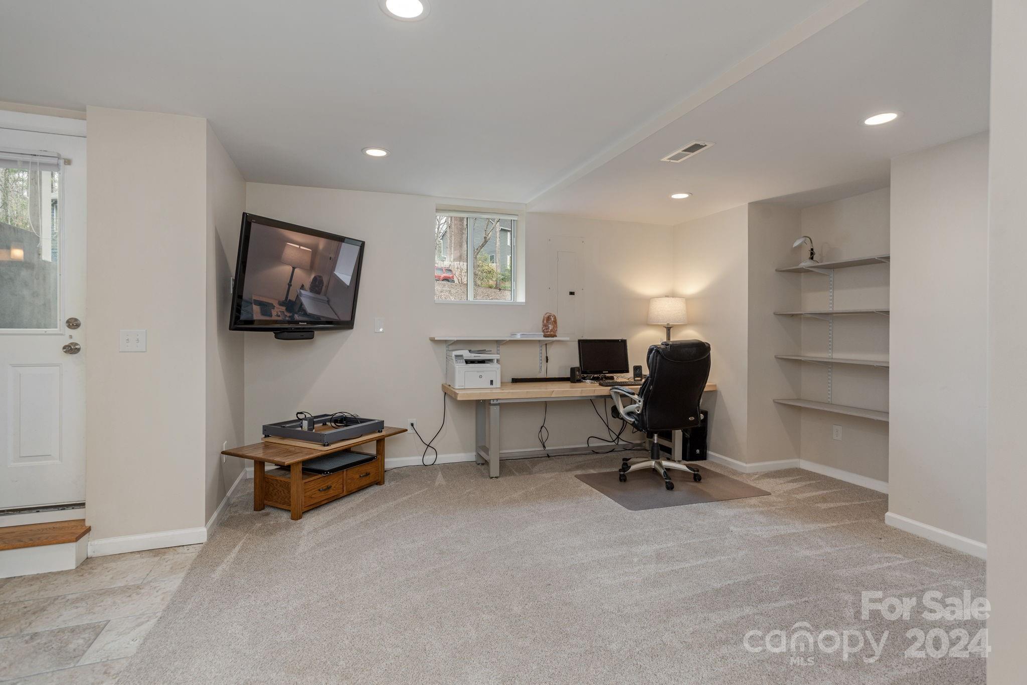 21 Spring Cove Court Arden, NC 28704 - Photo 25 of 32 a view of a workspace with furniture