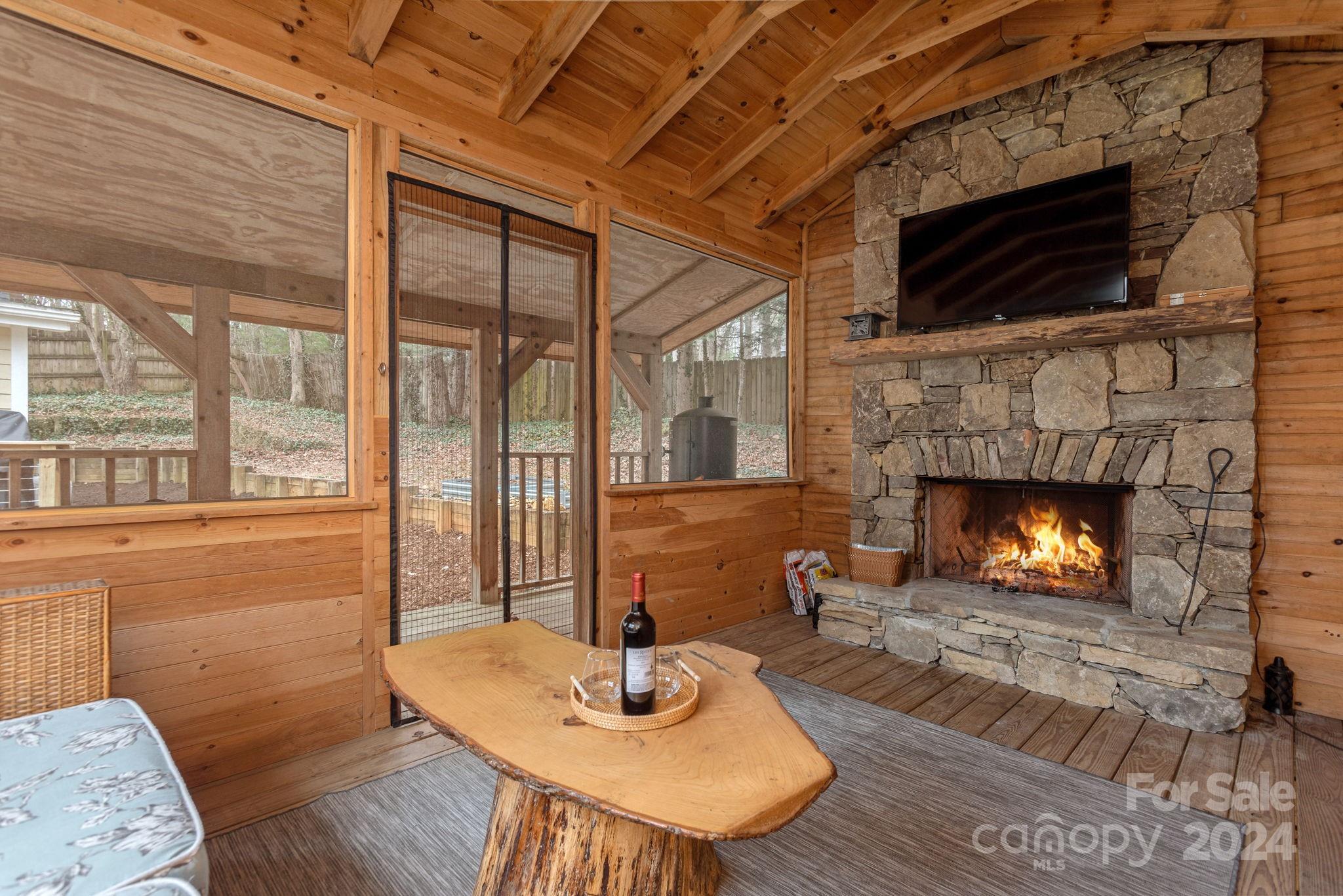 21 Spring Cove Court Arden, NC 28704 - Photo 32 of 32 a living room with furniture fireplace and flat screen tv