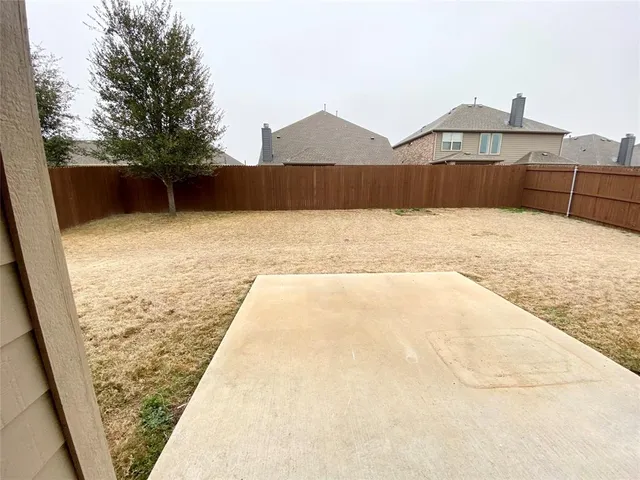 a view of outdoor space and yard