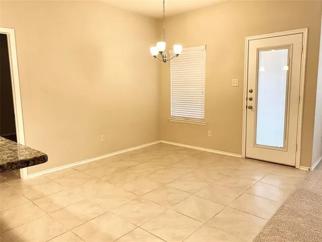 en empty room with windows