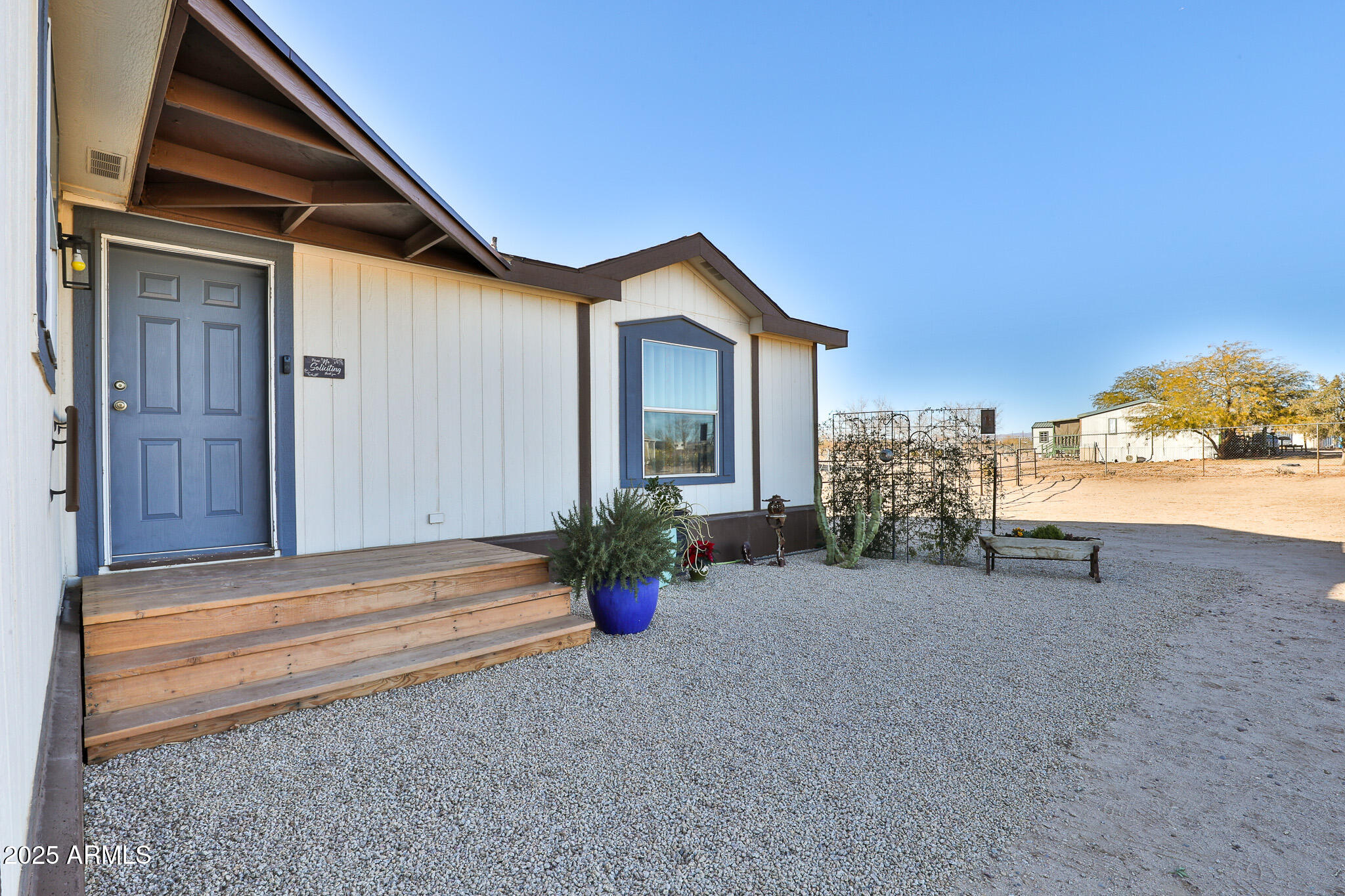 21020 West Montgomery Road Wittmann, AZ 85361 - Photo 4 of 69 New porch landing