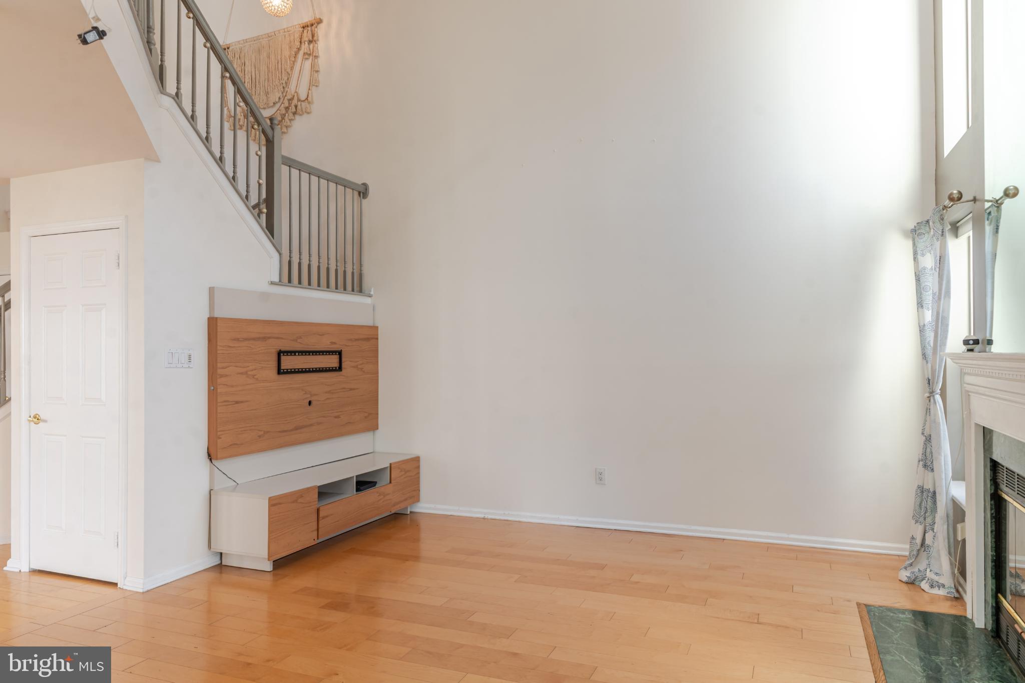 21 Stokes Road Mount Laurel, NJ 08054 - Photo 13 of 36 a view of an empty room and wooden floor