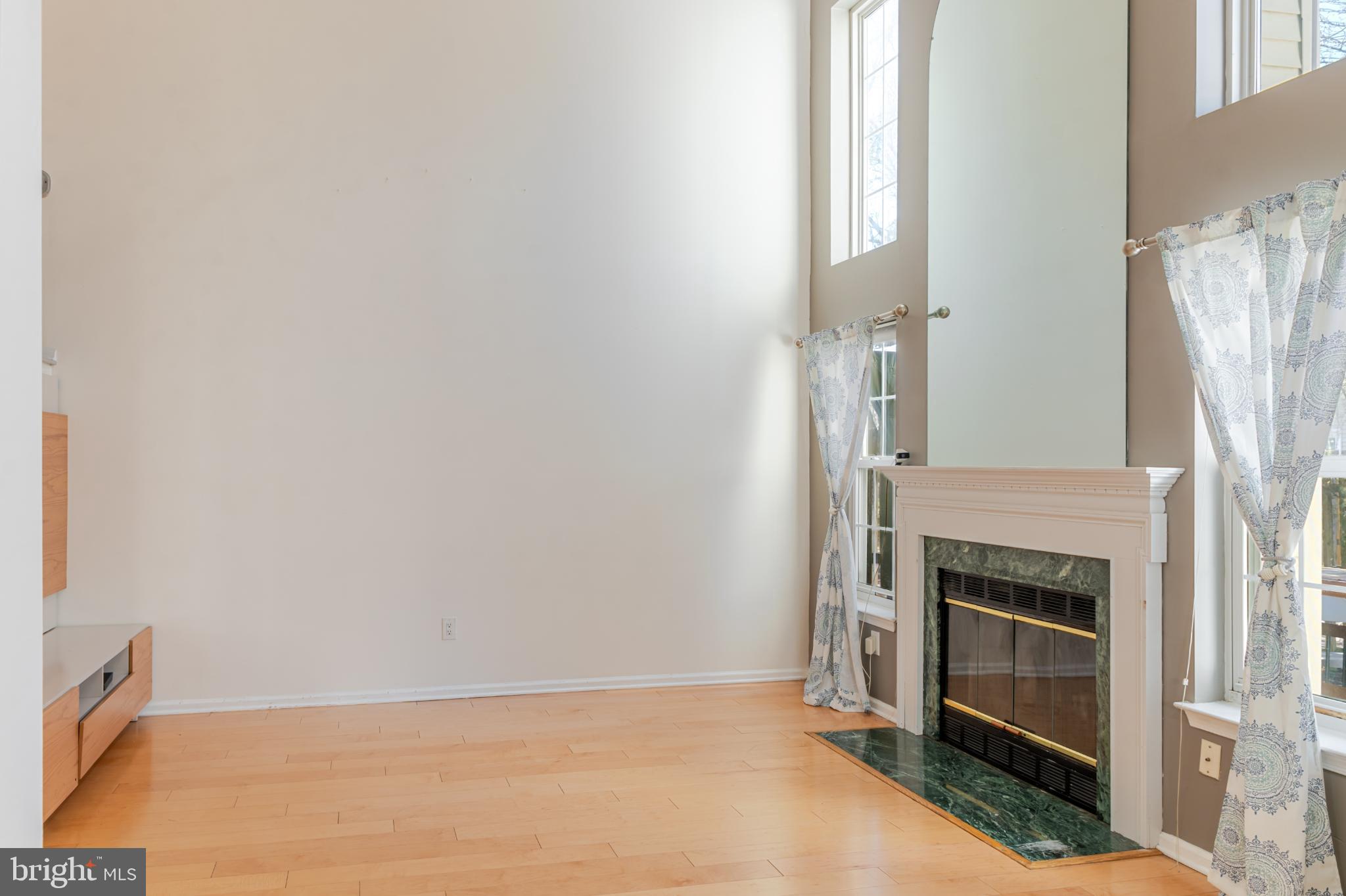 21 Stokes Road Mount Laurel, NJ 08054 - Photo 14 of 36 a view of empty room with a fireplace and wooden floor