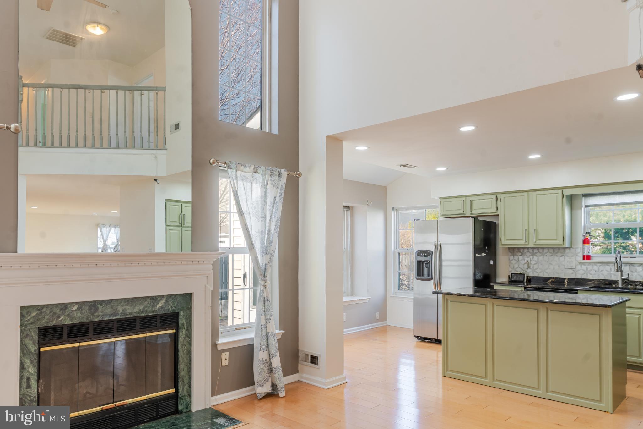 21 Stokes Road Mount Laurel, NJ 08054 - Photo 17 of 36 a kitchen with stainless steel appliances a refrigerator and a stove top oven