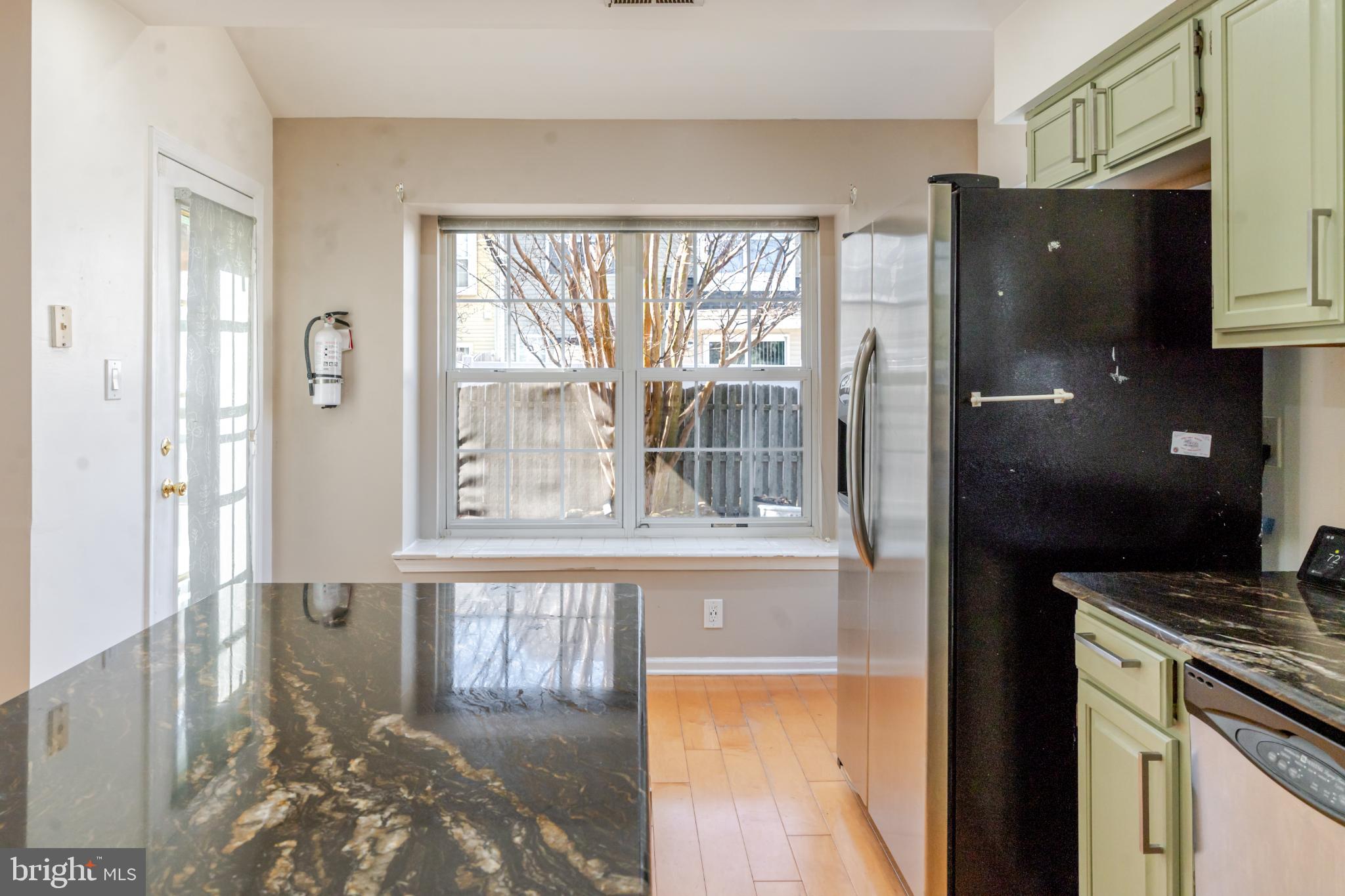 21 Stokes Road Mount Laurel, NJ 08054 - Photo 20 of 36 a kitchen with a refrigerator a stove and a window