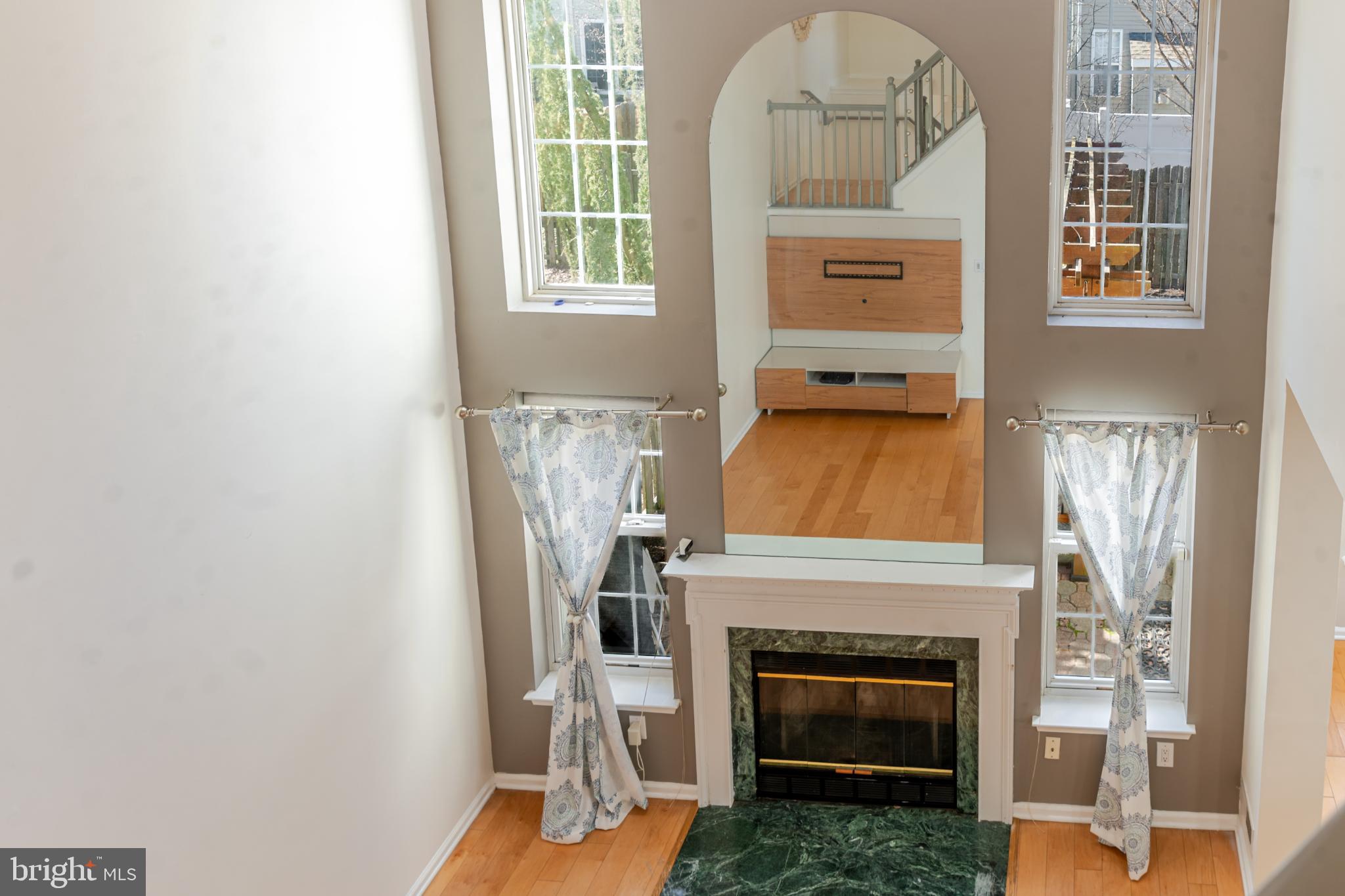 21 Stokes Road Mount Laurel, NJ 08054 - Photo 23 of 36 an entryway with fireplace and a window