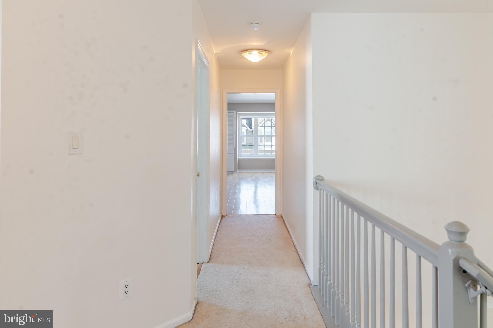 21 Stokes Road Mount Laurel, NJ 08054 - Photo 24 of 36 a view of a hallway with wooden floor