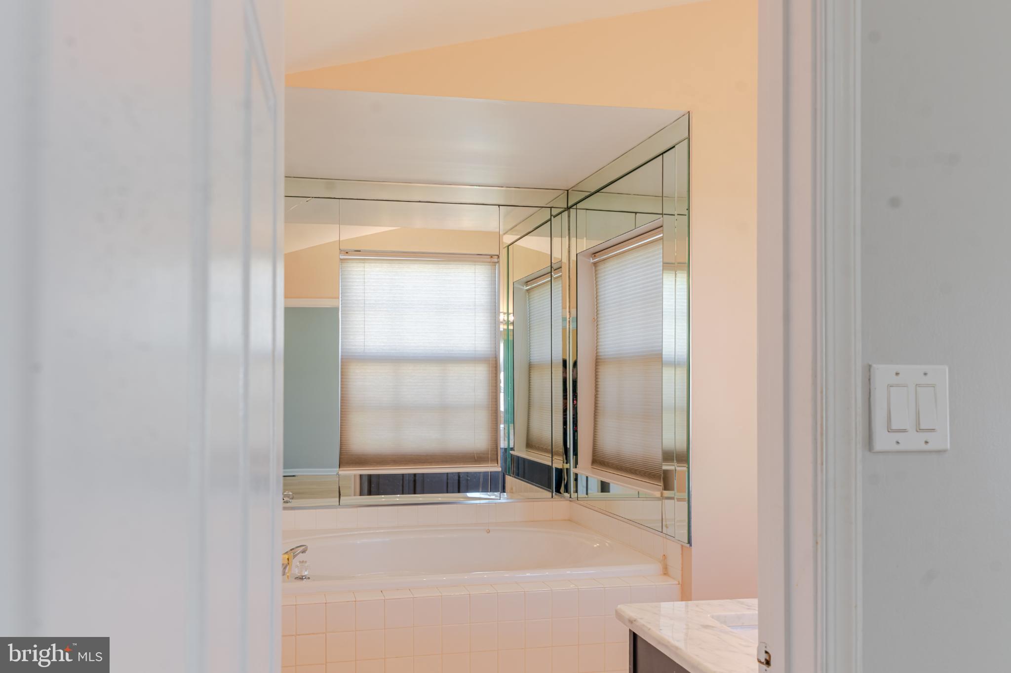 21 Stokes Road Mount Laurel, NJ 08054 - Photo 26 of 36 a bathroom with a glass shower door