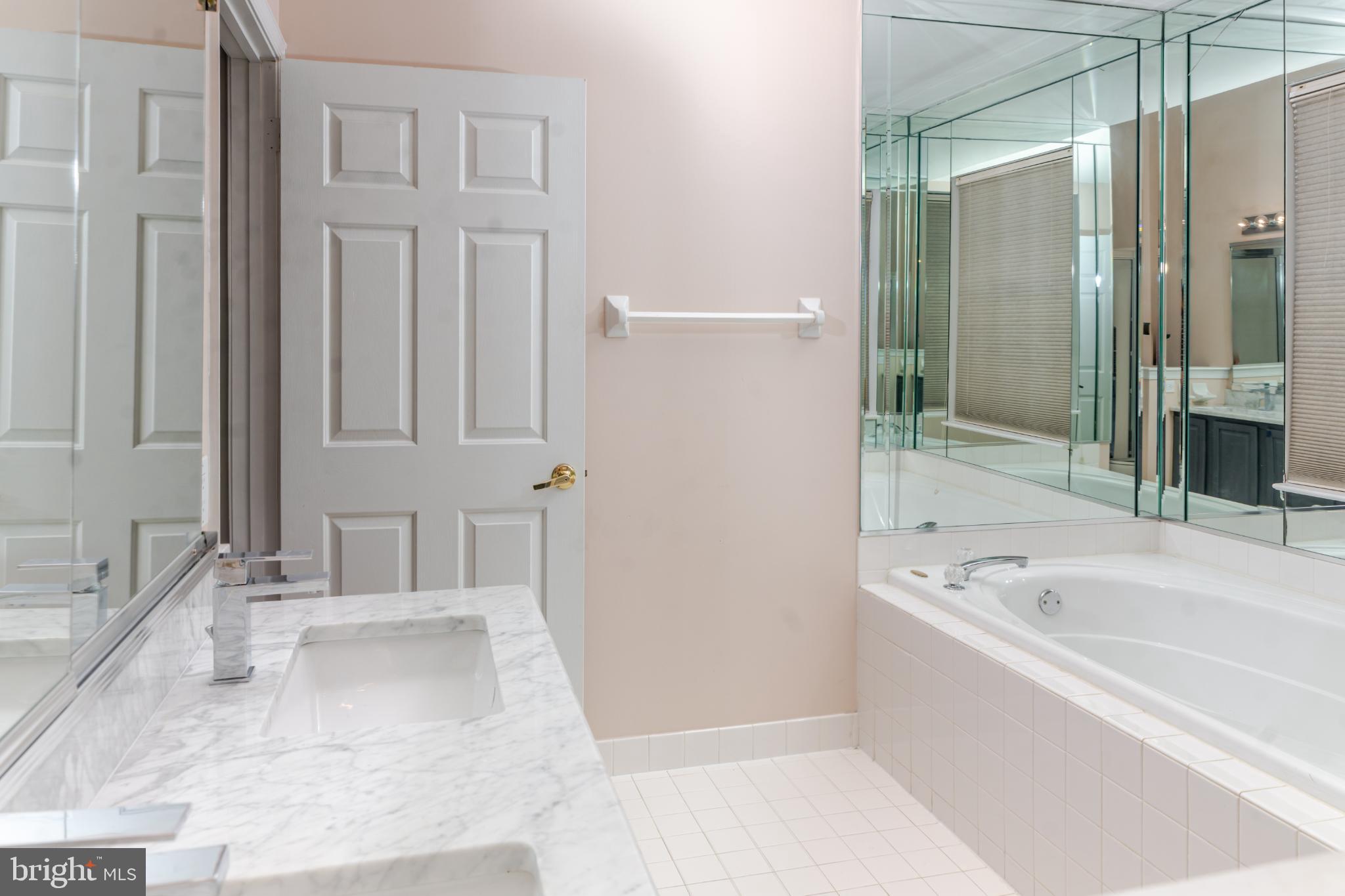 21 Stokes Road Mount Laurel, NJ 08054 - Photo 27 of 36 a bathroom with a bathtub and a sink