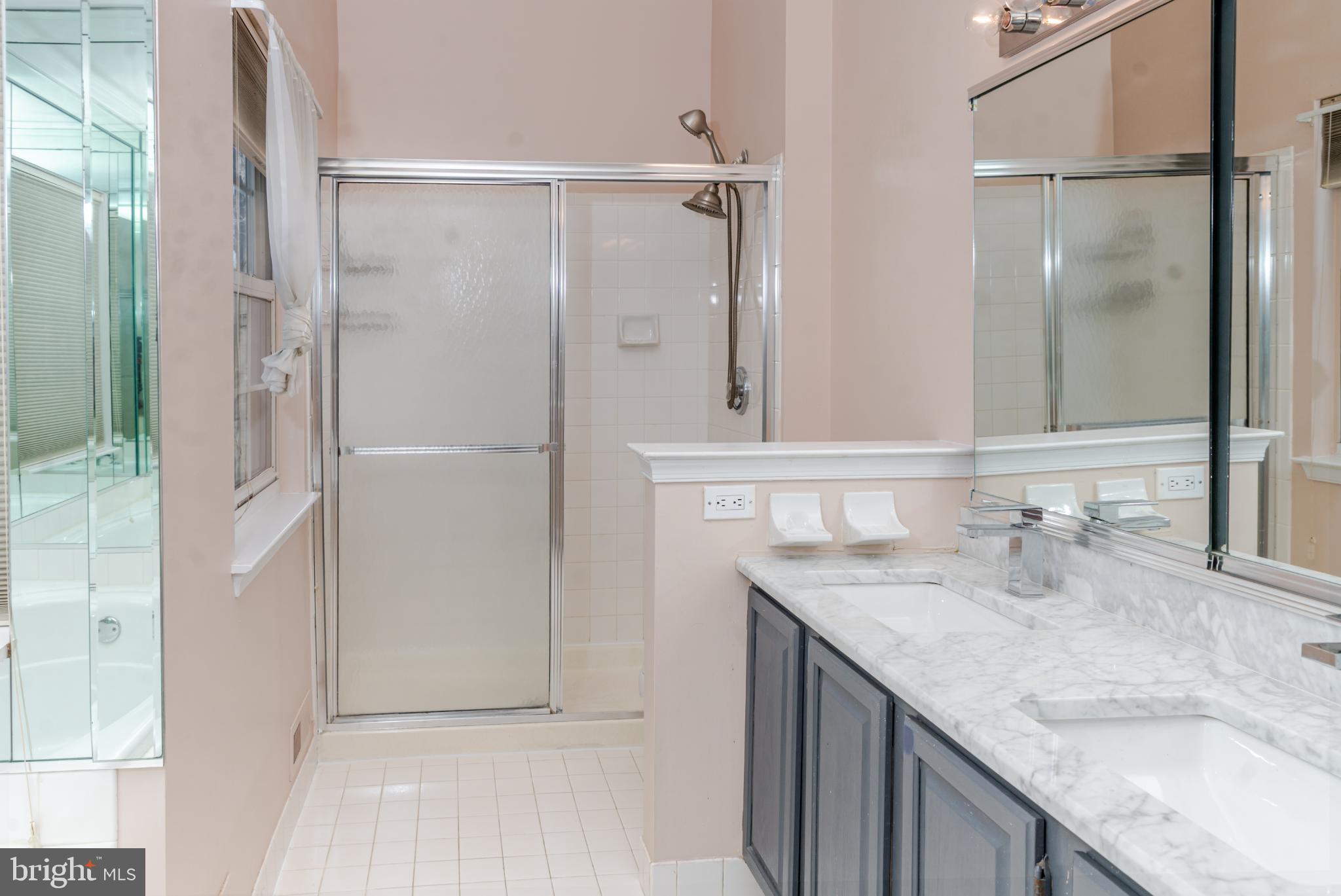 21 Stokes Road Mount Laurel, NJ 08054 - Photo 28 of 36 a bathroom with a granite countertop shower sink and mirror