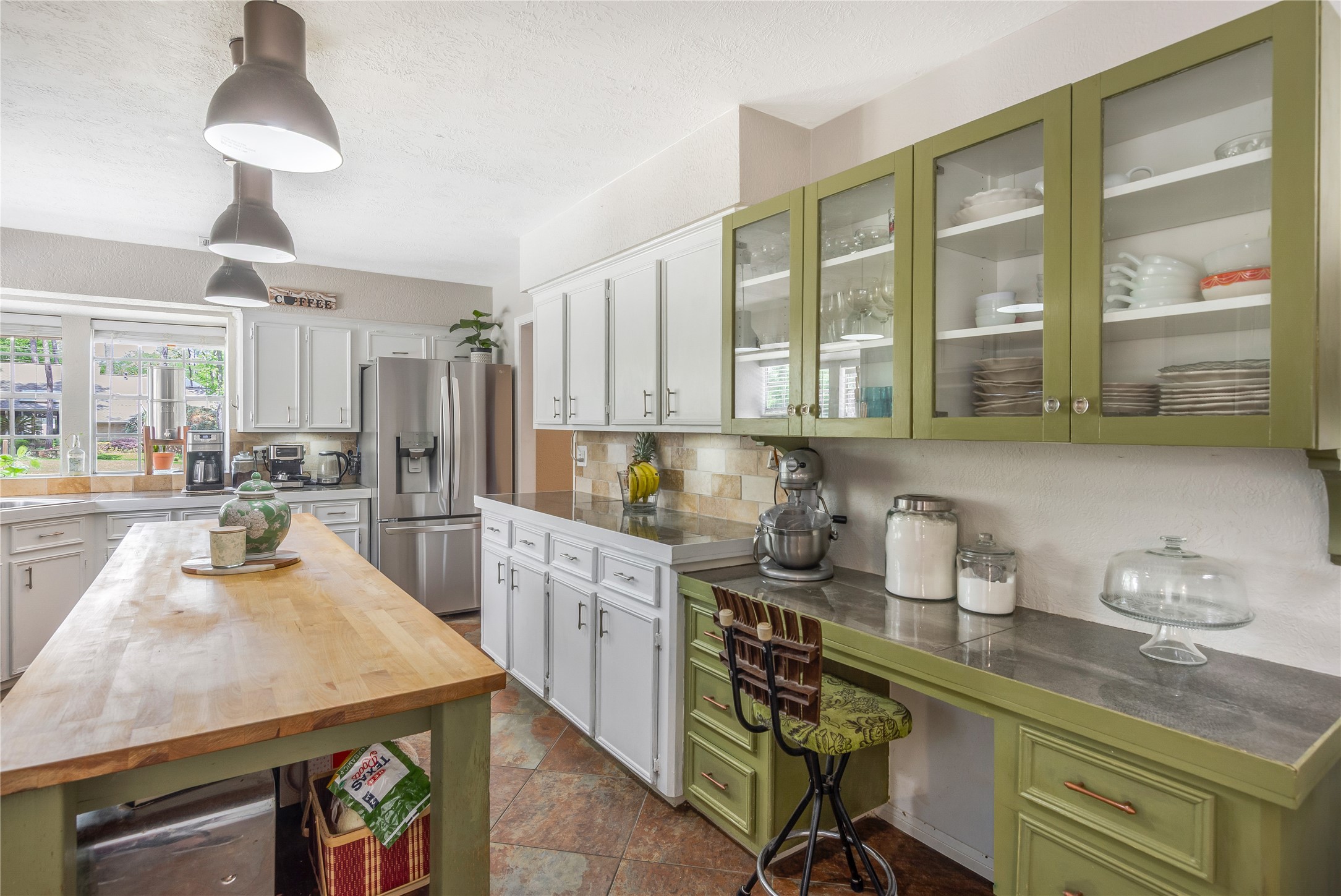 6411 Northway Drive Spring, TX 77389 - Photo 14 of 39 a kitchen with counter top space appliances and cabinets