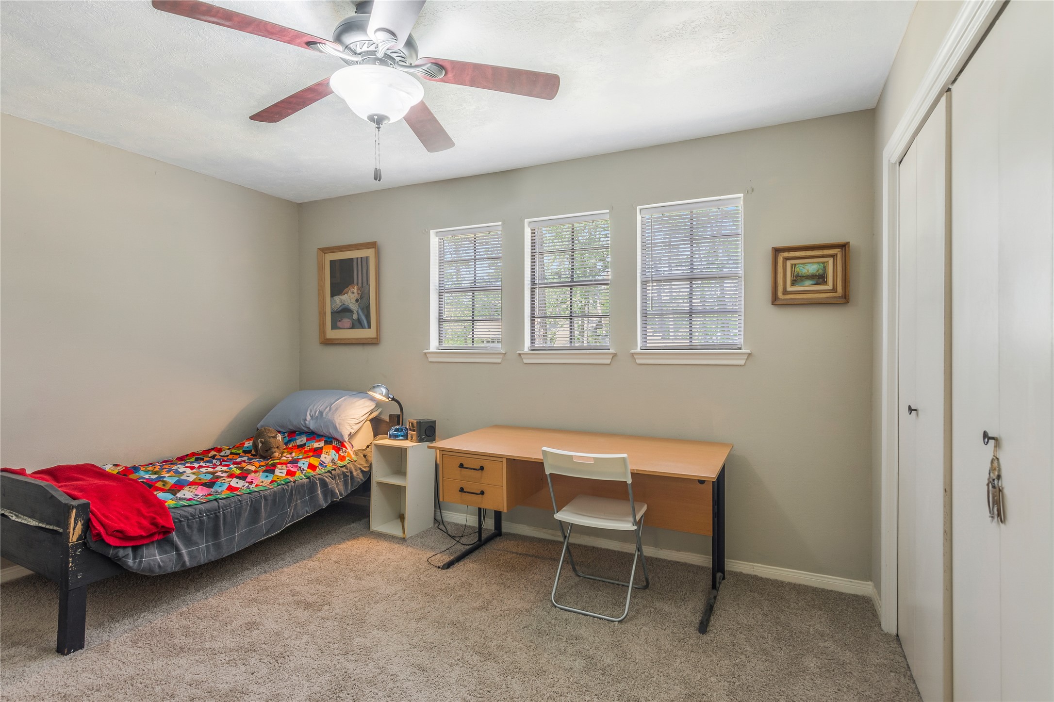 6411 Northway Drive Spring, TX 77389 - Photo 32 of 39 a bedroom with bed and a window