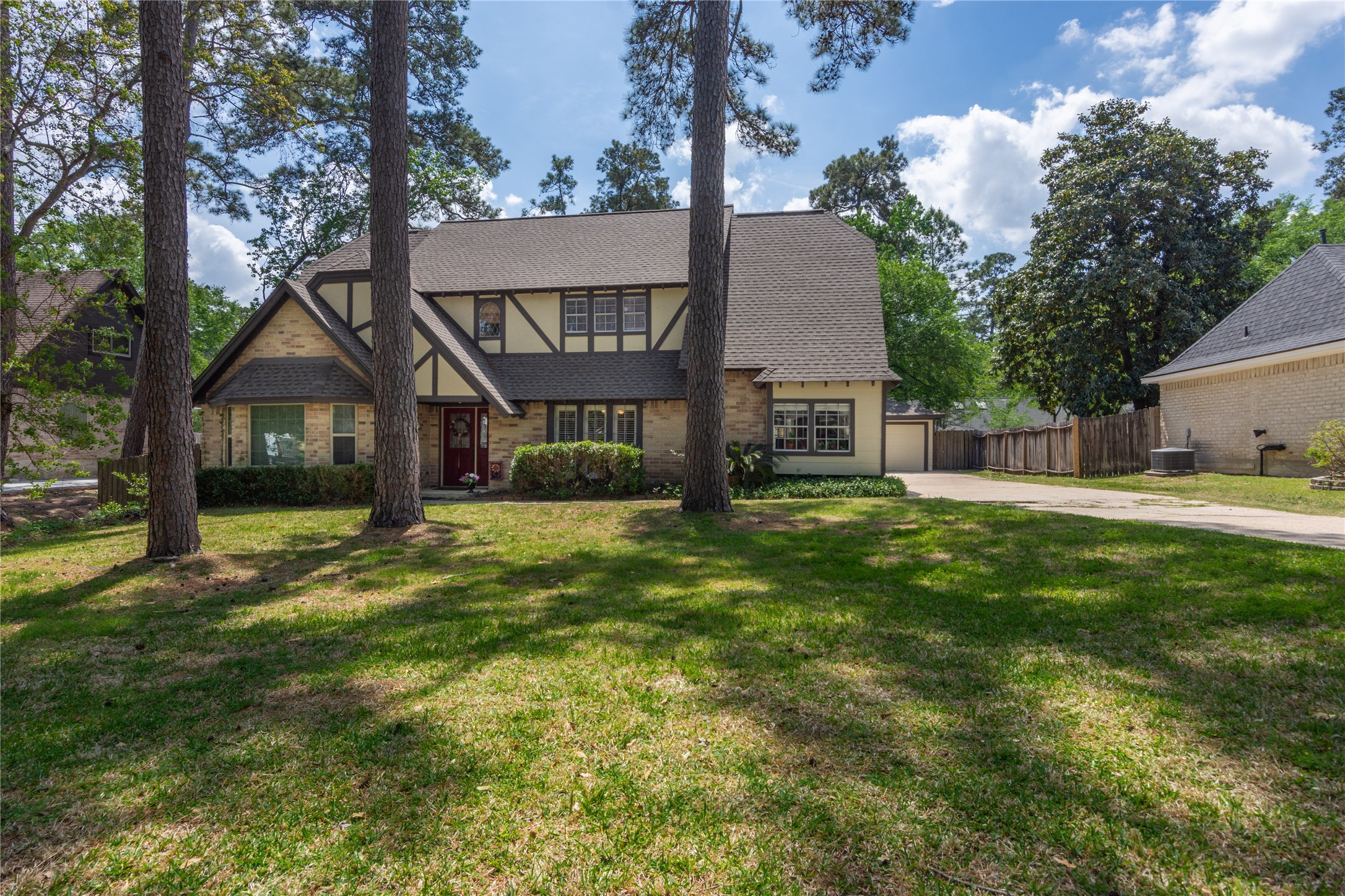 6411 Northway Drive Spring, TX 77389 - Photo 7 of 39 a front view of a house with a yard