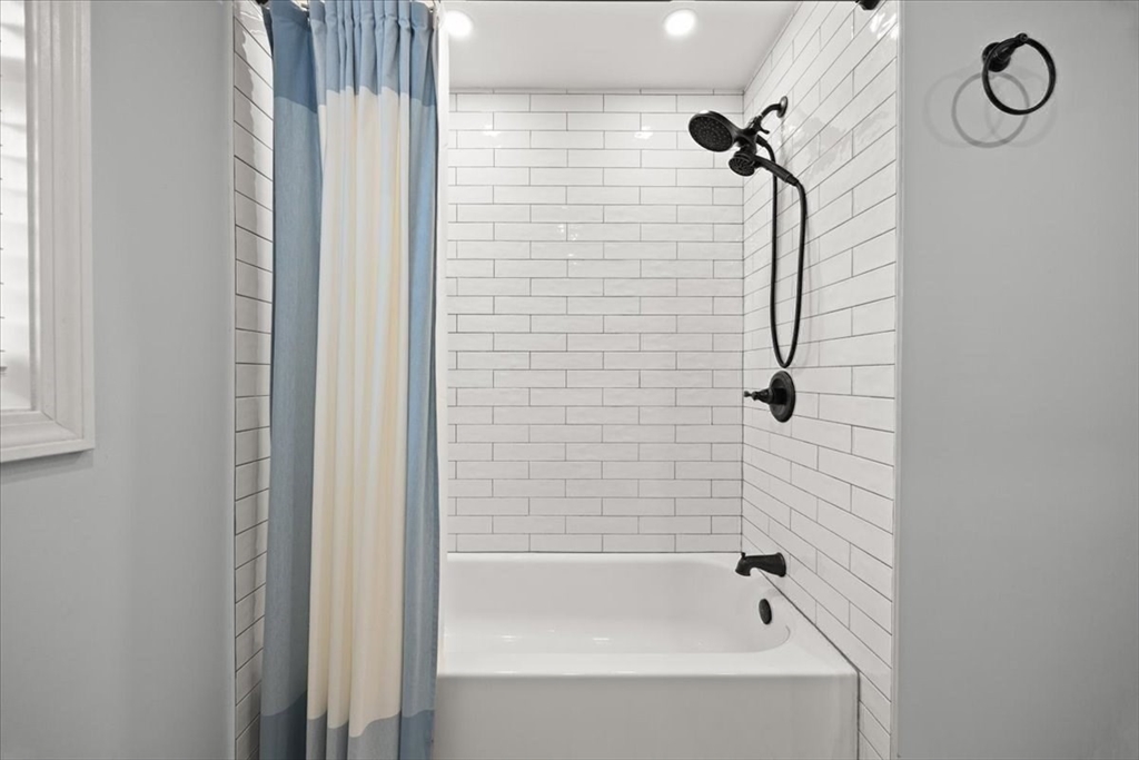 143 Morrison Road East Taunton, MA 02718 - Photo 15 of 31 a bathroom with a bathtub