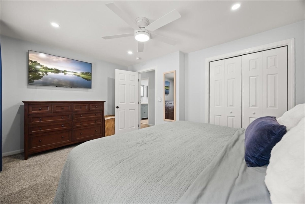 143 Morrison Road East Taunton, MA 02718 - Photo 18 of 31 a bed room with a bed and a television