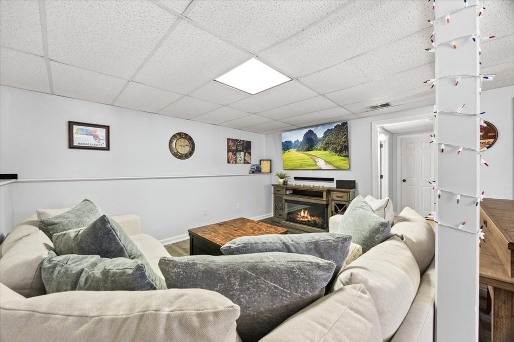 143 Morrison Road East Taunton, MA 02718 - Photo 22 of 31 a living room with furniture and wooden floor