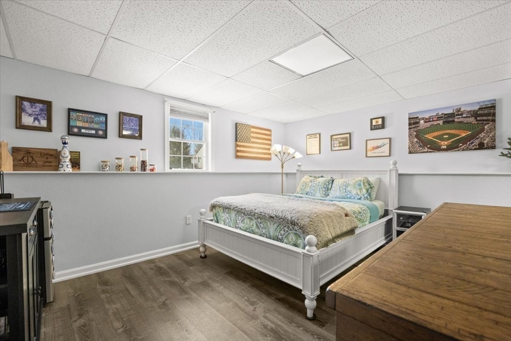 143 Morrison Road East Taunton, MA 02718 - Photo 23 of 31 a bedroom with a bed and two windows