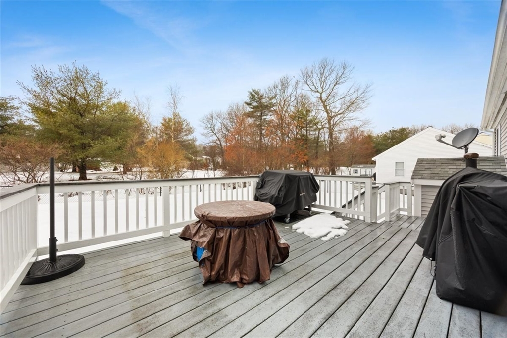 143 Morrison Road East Taunton, MA 02718 - Photo 27 of 31 a view of a deck with furniture and wooden floor