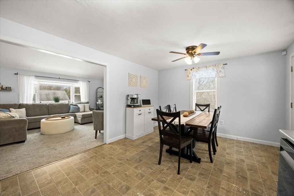 143 Morrison Road East Taunton, MA 02718 - Photo 9 of 31 a view of a dining room with furniture and chandelier