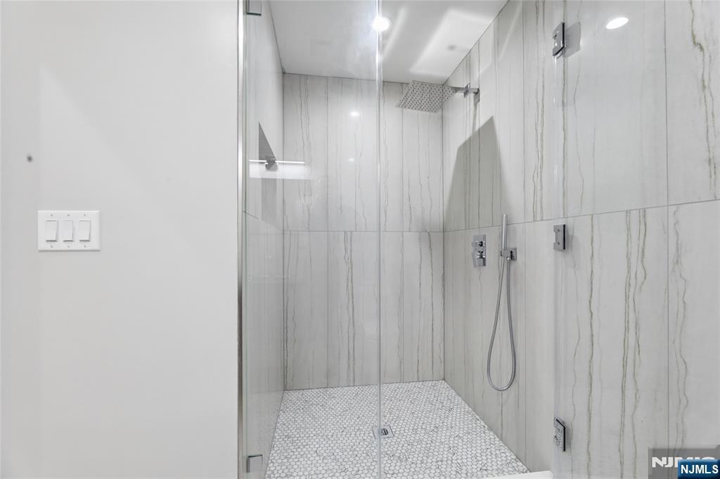 31 Engleside Street Cresskill, NJ 07626 - Photo 37 of 49 a bathroom with a shower
