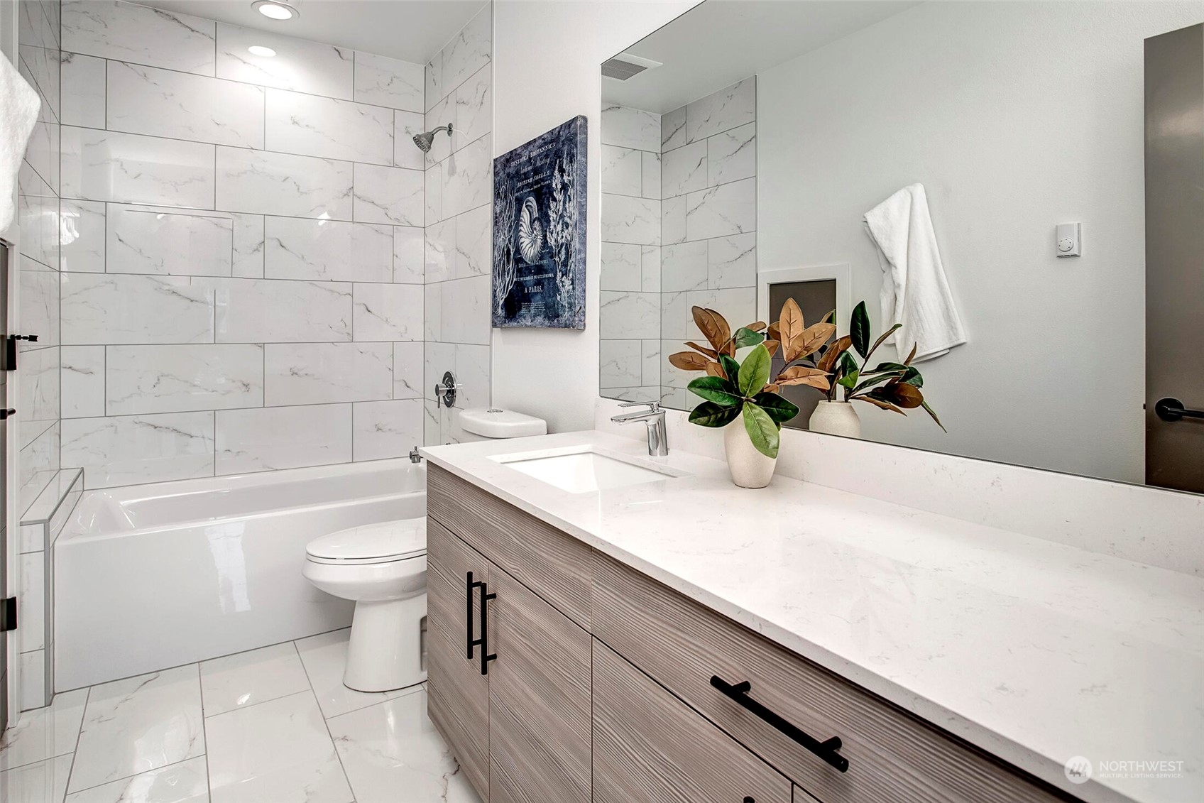4020 Midvale Avenue North Seattle, WA 98103 - Photo 6 of 28 a bathroom with a sink a toilet and bathtub