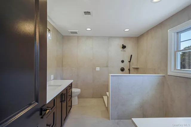 a view of a hallway with windows