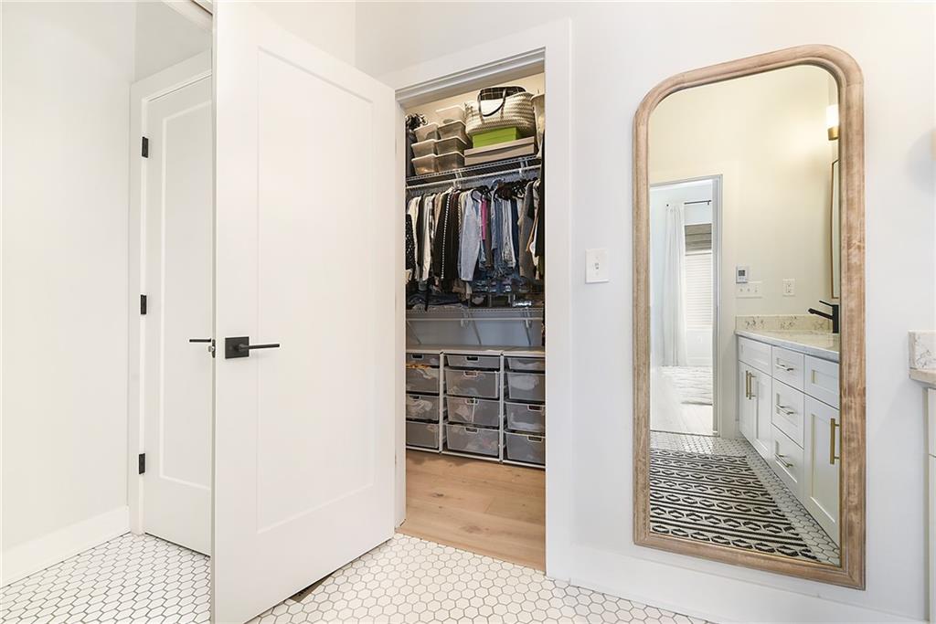 313 38th Street Pittsburgh, PA 15201 - Photo 18 of 25 a view of a walk in closet and bathroom