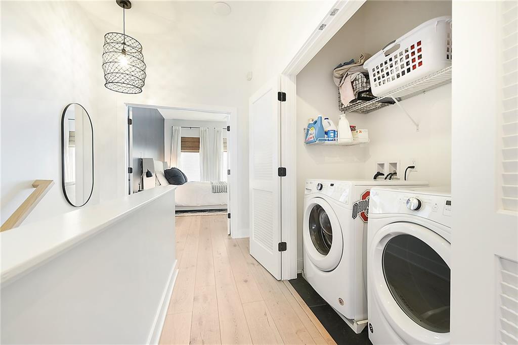 313 38th Street Pittsburgh, PA 15201 - Photo 19 of 25 a view of a hallway with washer and dryer