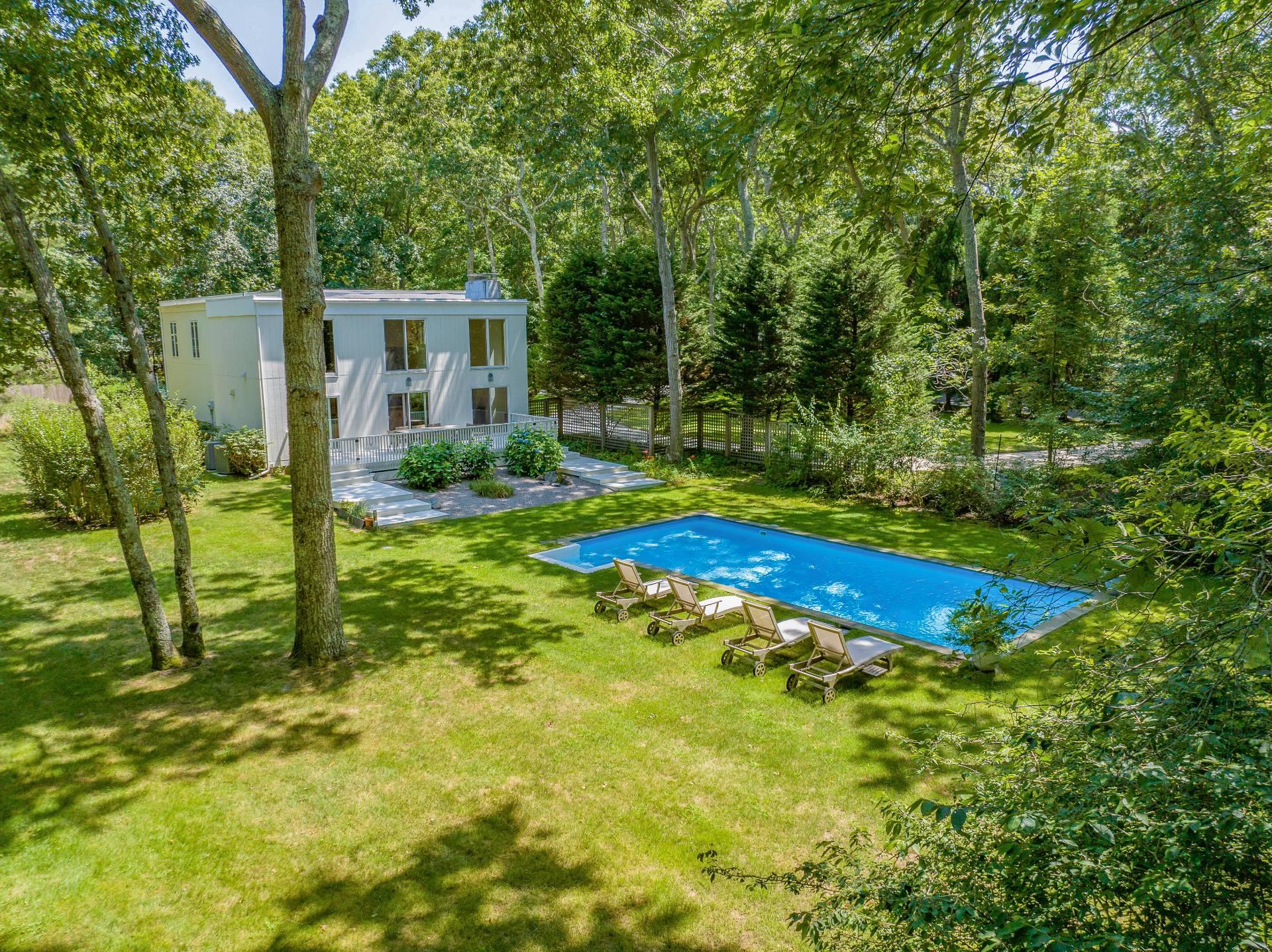 28 Georgica Close Road East Hampton, NY 11937 - Photo 20 of 23 Pool with a forest view and a yard