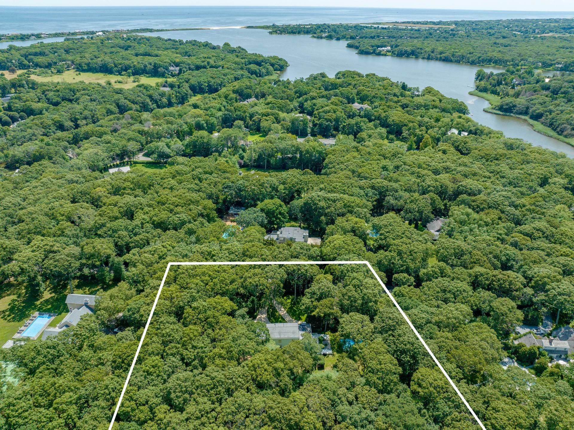 28 Georgica Close Road East Hampton, NY 11937 - Photo 23 of 23 Aerial view with a water view and a wooded view