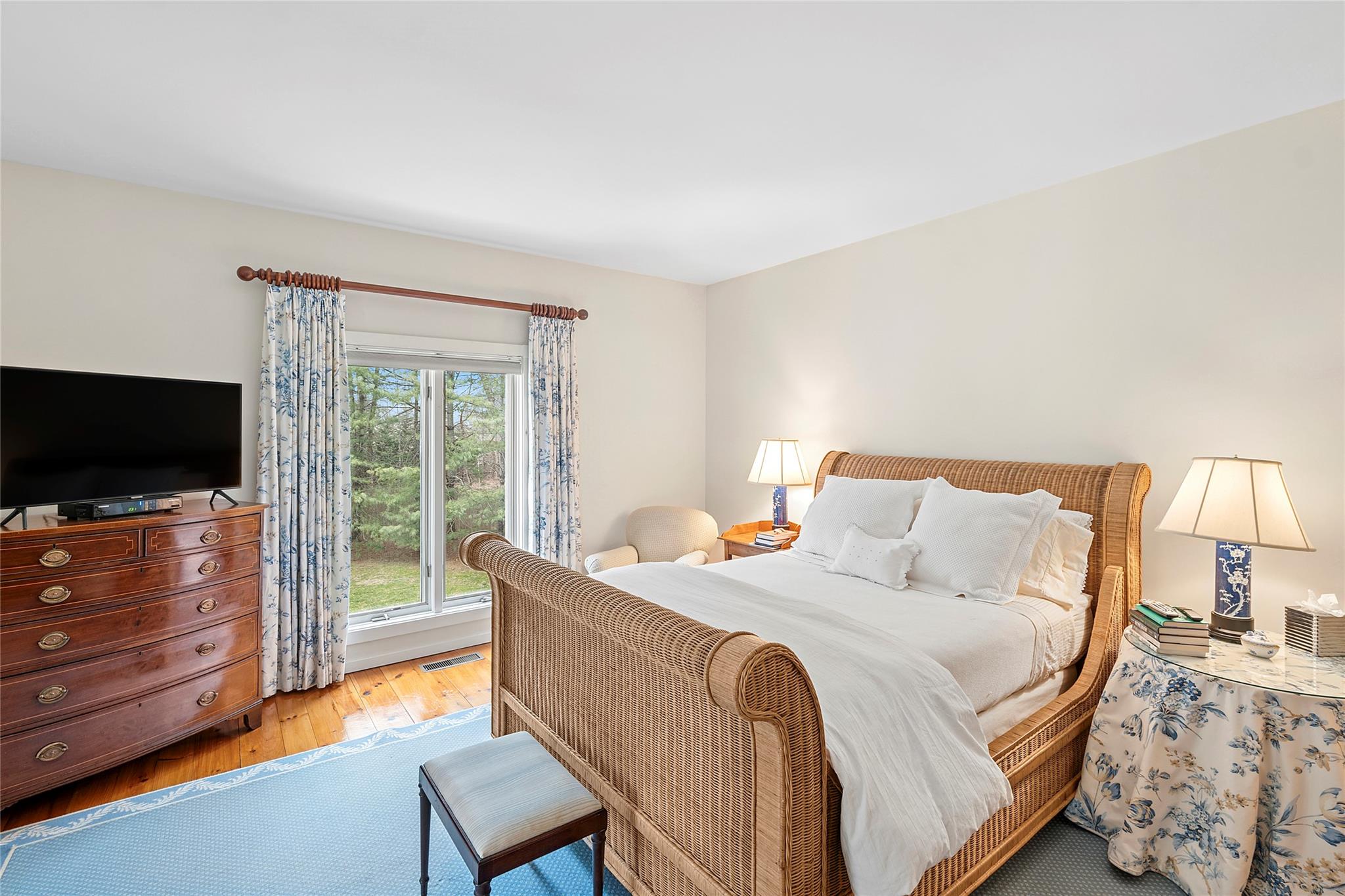 28 Georgica Close Road East Hampton, NY 11937 - Photo 9 of 23 Bedroom with visible vents and wood finished floors