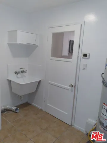 a bathroom with a toilet and a sink