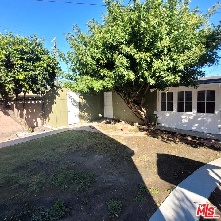 3760 Wellington Road Los Angeles, CA 90016 - Photo 49 of 52 a view of a house with backyard and sitting area