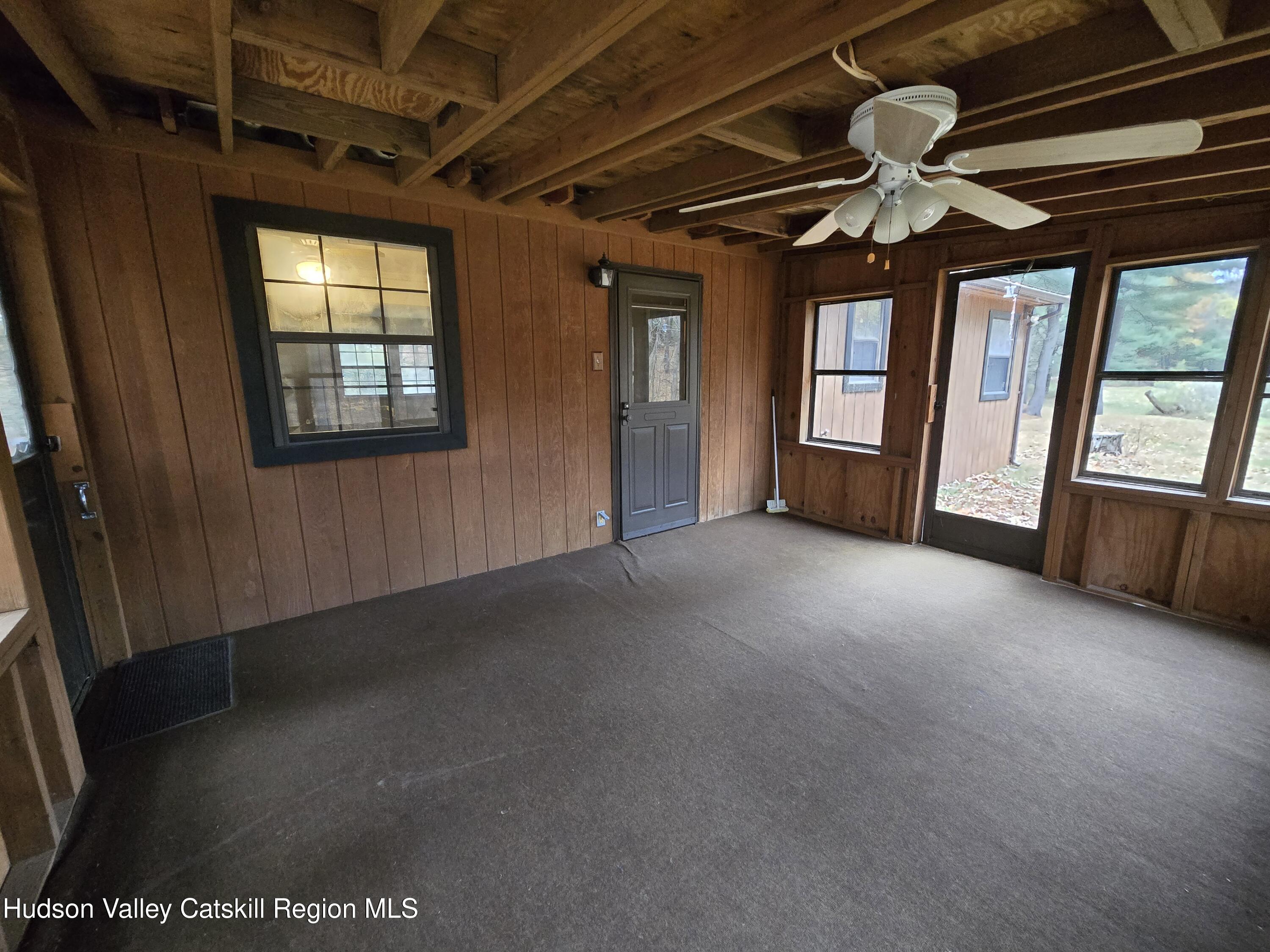 386 Fowler Lake Road Ghent, NY 12075 - Photo 14 of 24 a view of an empty room with a window