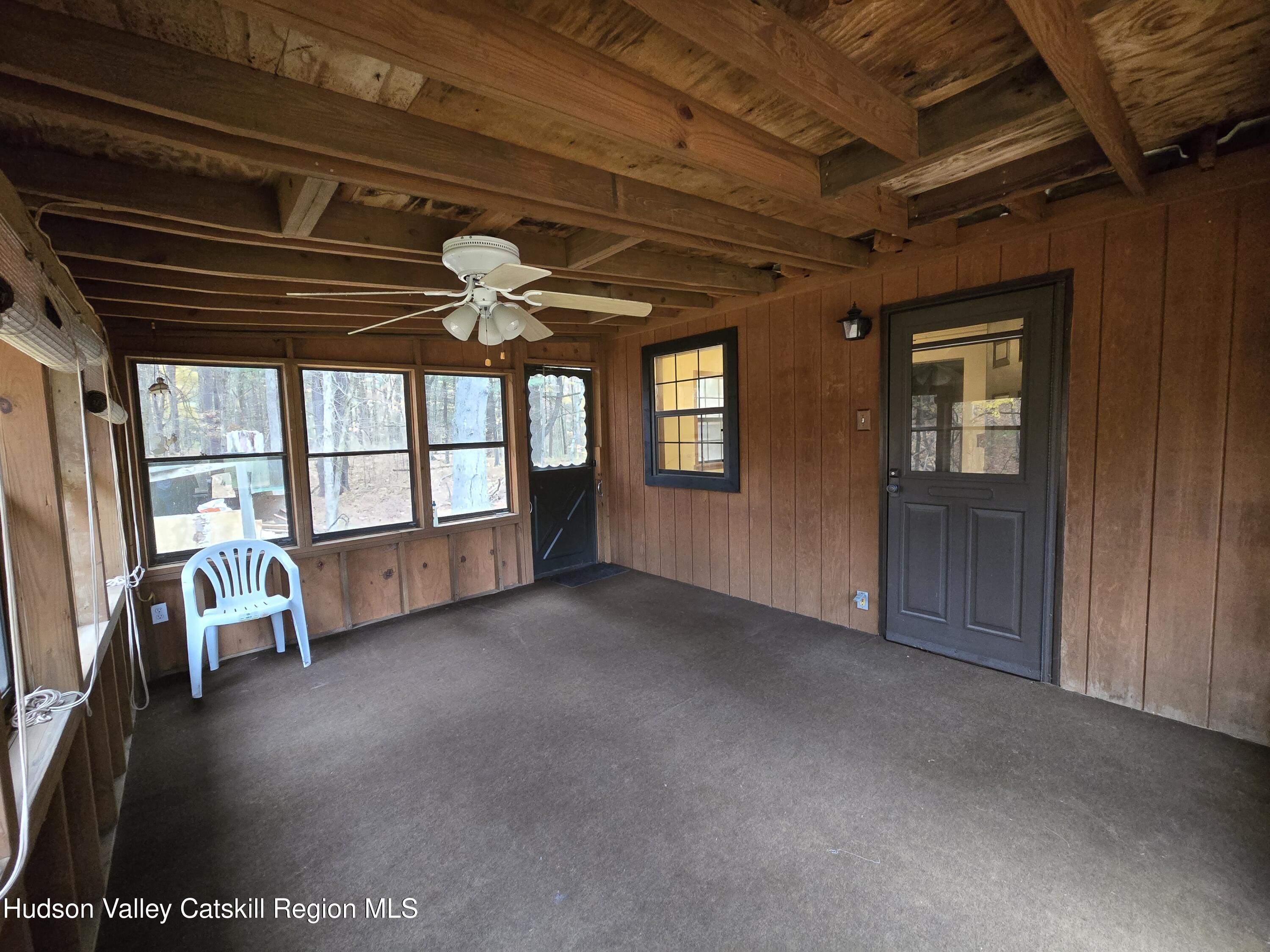 386 Fowler Lake Road Ghent, NY 12075 - Photo 15 of 24 a view of an empty room with a window