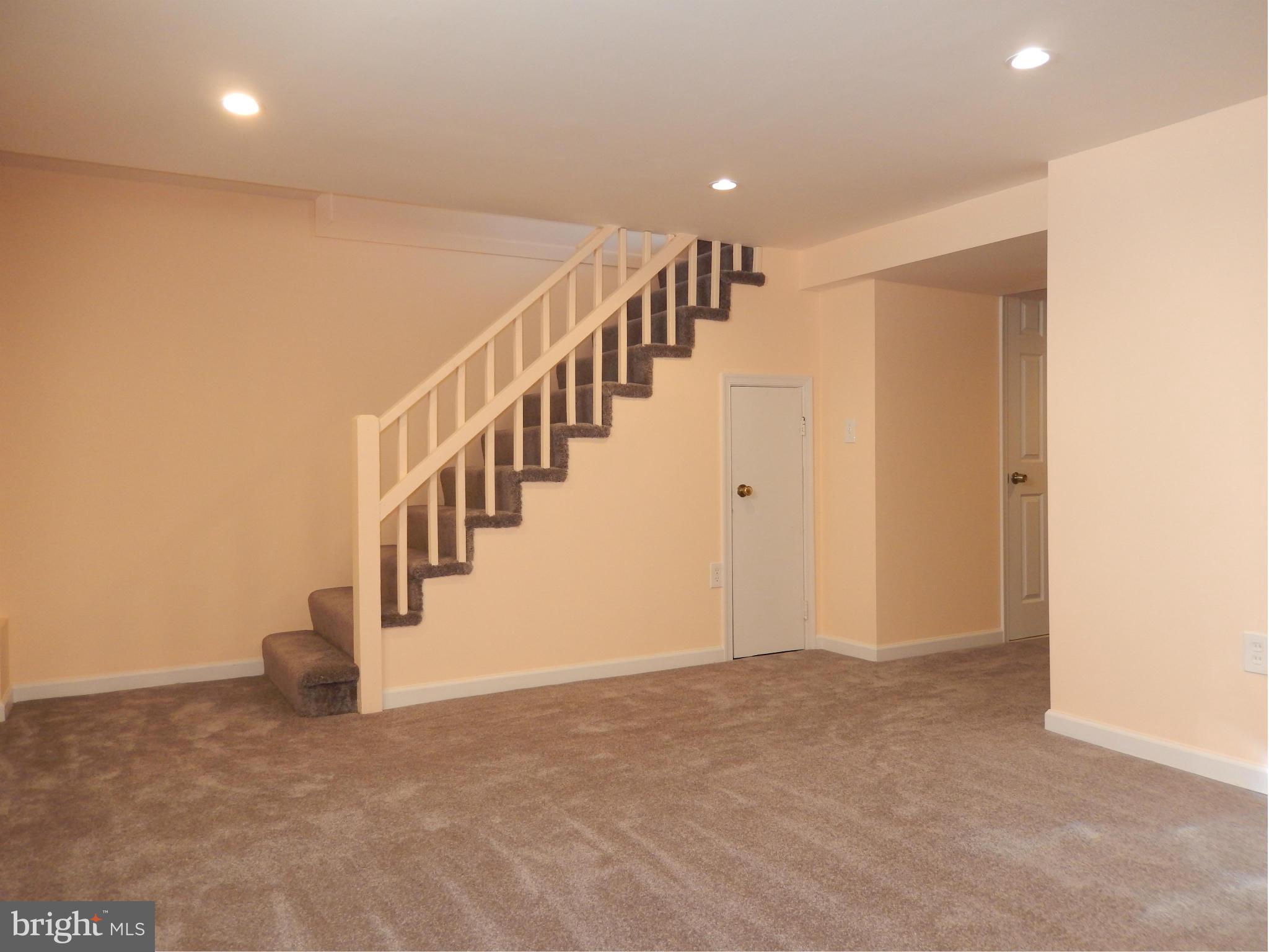 4772 Melbourne Road Baltimore, MD 21229 - Photo 21 of 30 a view of an entryway with stairs