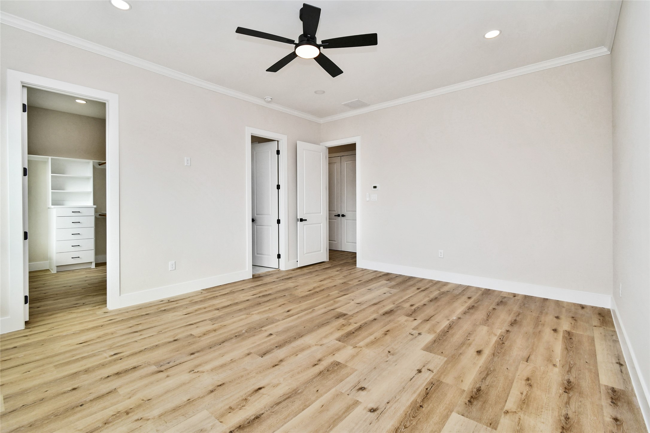 3231 Tuam Street Houston, TX 77004 - Photo 26 of 47 an empty room with wooden floor and windows