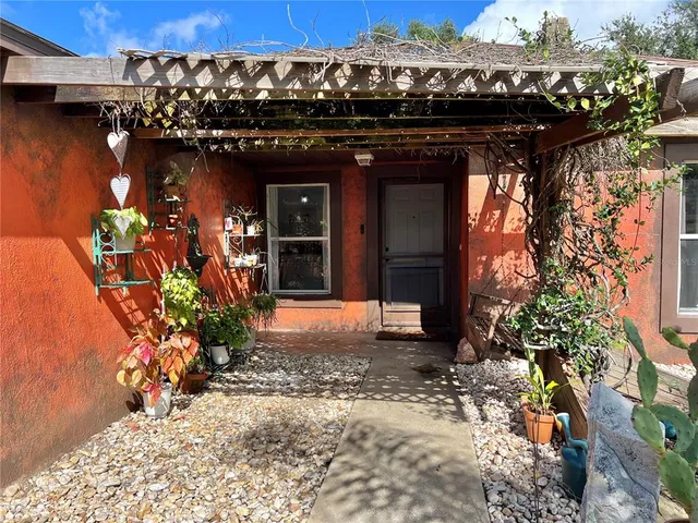 a view of a pathway along the building