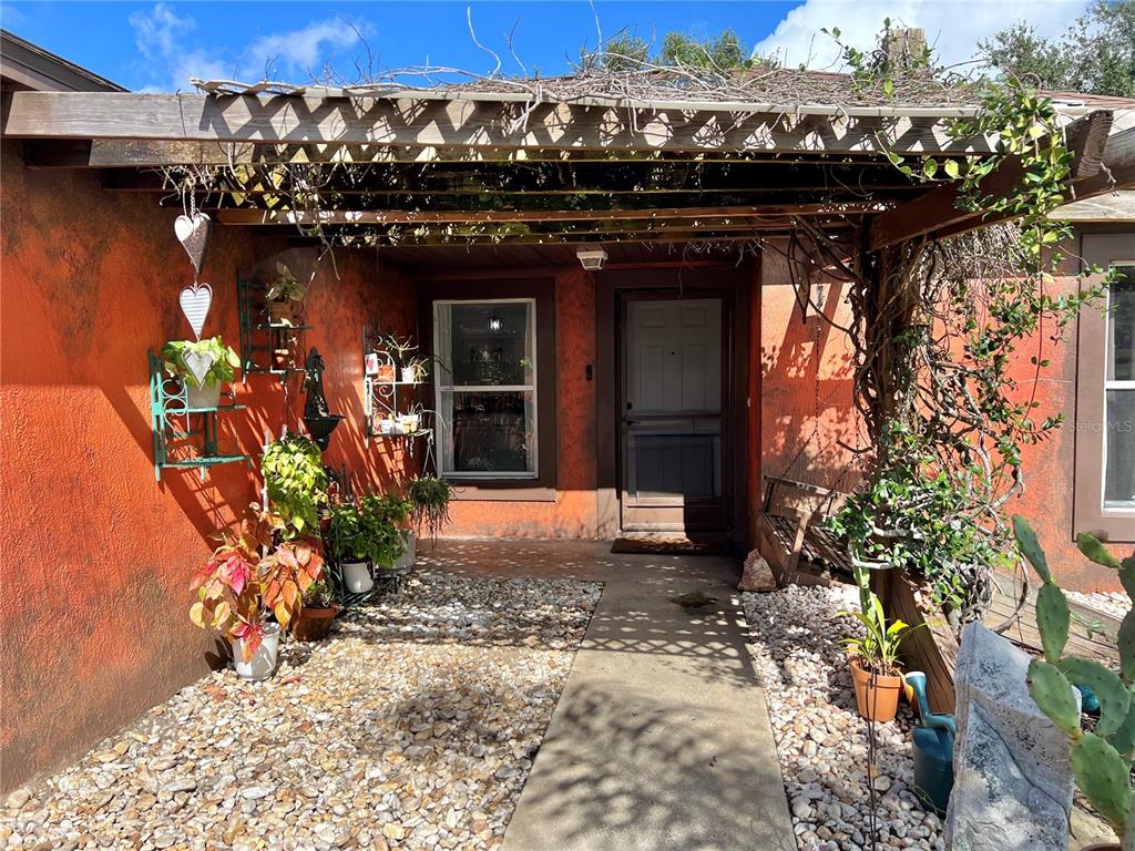 14906 Windy Mt Circle Clermont, FL 34711 - Photo 3 of 26 a view of a pathway along the building