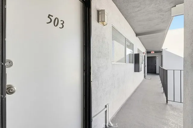 a view of hallway with stairs