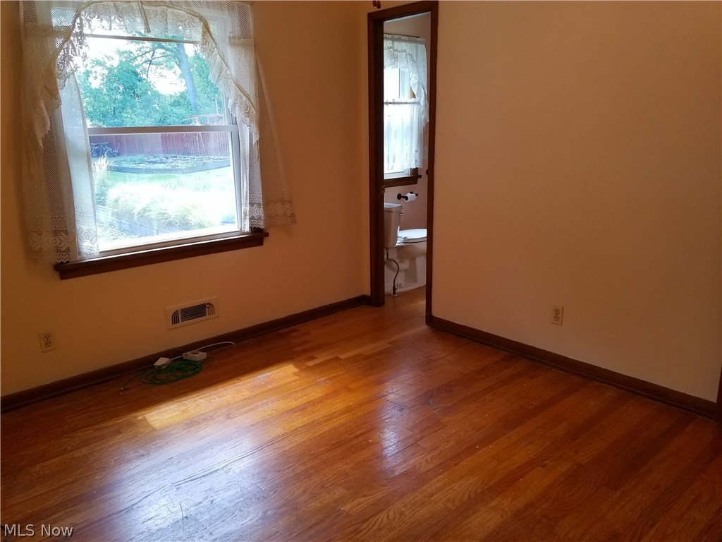 1915 Lorimer Road Cleveland, OH 44134 - Photo 10 of 29 Bedroom two of three with adjoining half bath