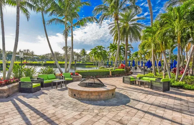 a view of a park with iron fence