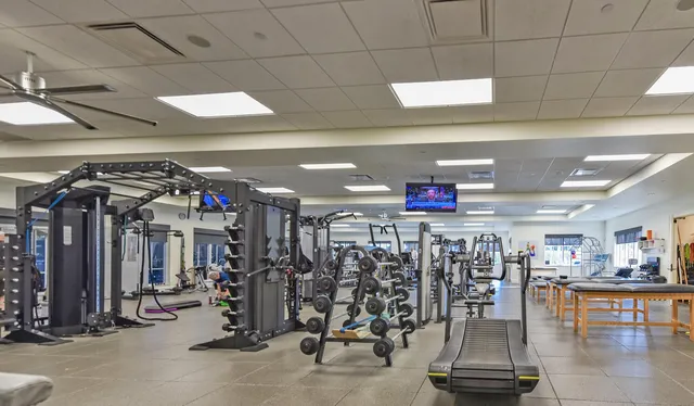 a view of a room with gym equipment