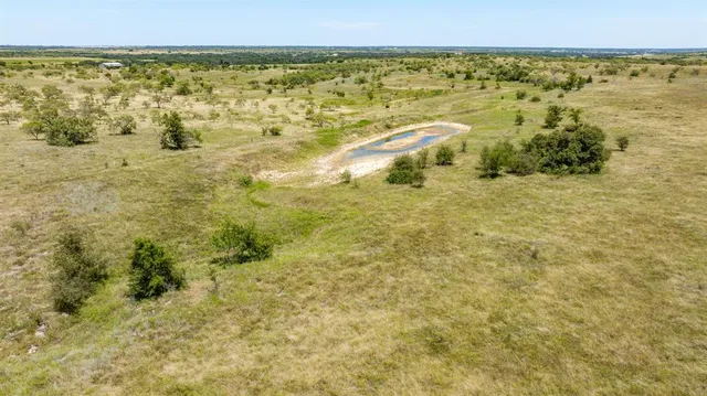 a view of beach with swimming pool