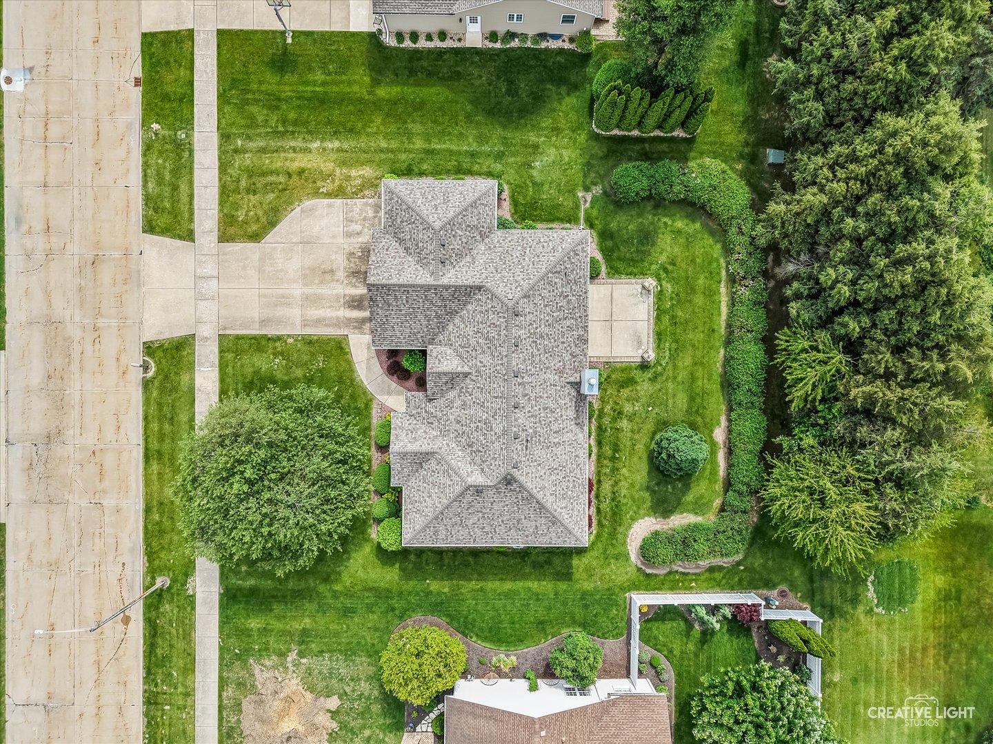 714 East Knights Road Sandwich, IL 60548 - Photo 29 of 33 an aerial view of a house with garden space and outdoor seating