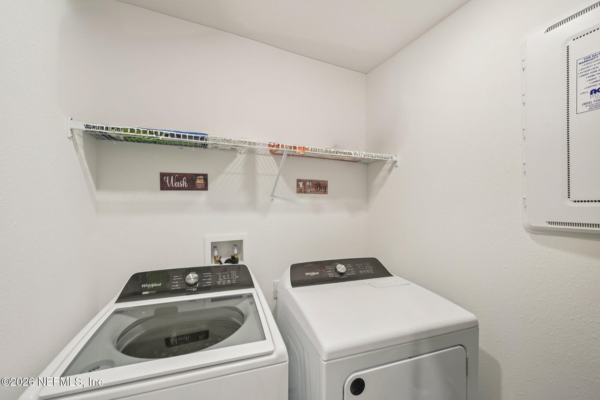 5508 Integrity Way Jacksonville, FL 32244 - Photo 11 of 34 a utility room with dryer and washer
