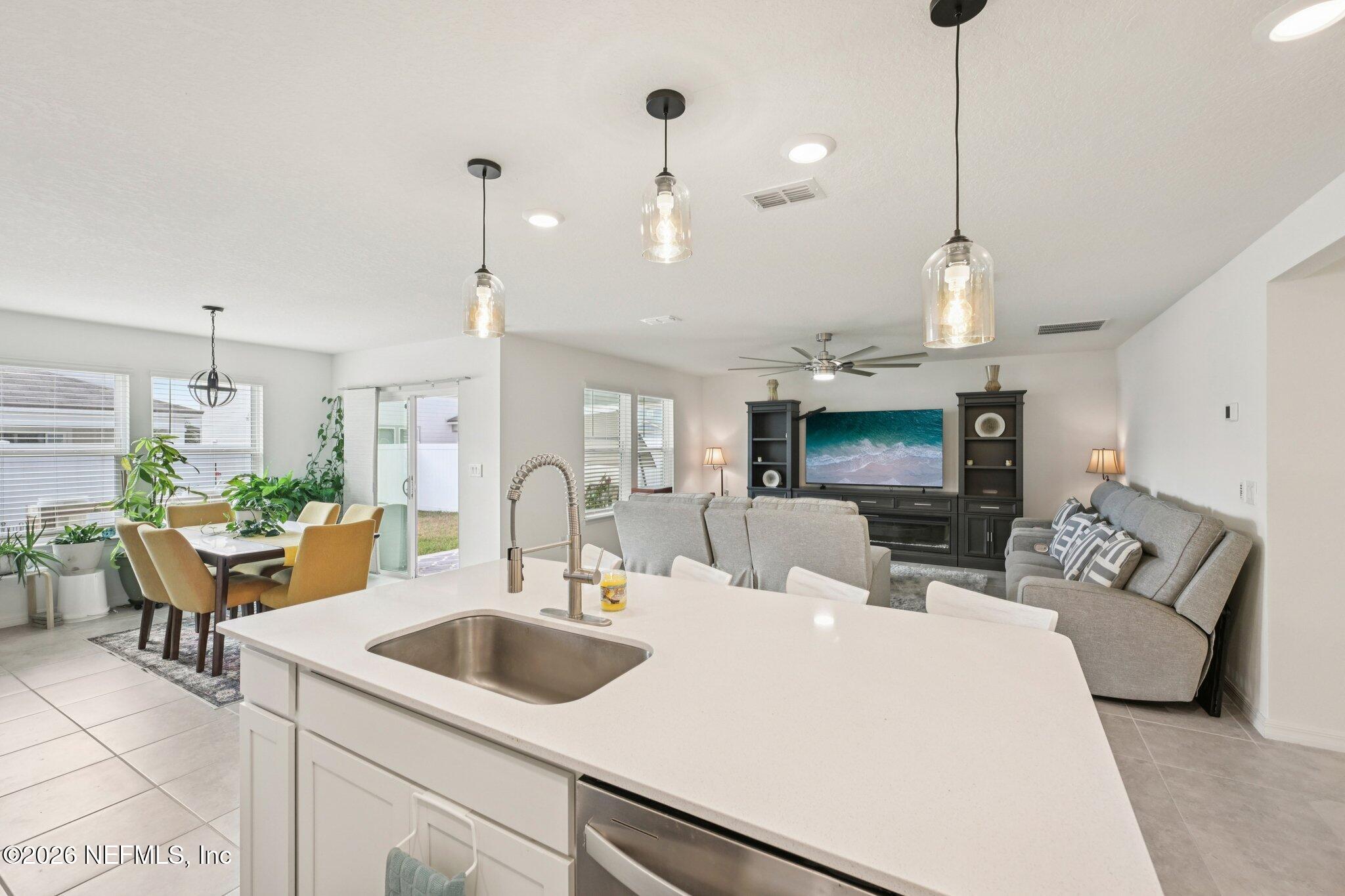 5508 Integrity Way Jacksonville, FL 32244 - Photo 21 of 34 a view of living room with furniture and a flat screen tv