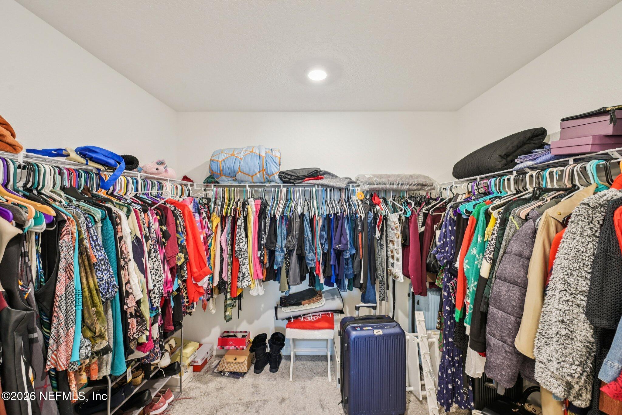 5508 Integrity Way Jacksonville, FL 32244 - Photo 28 of 34 a view of walk in closet with clothes