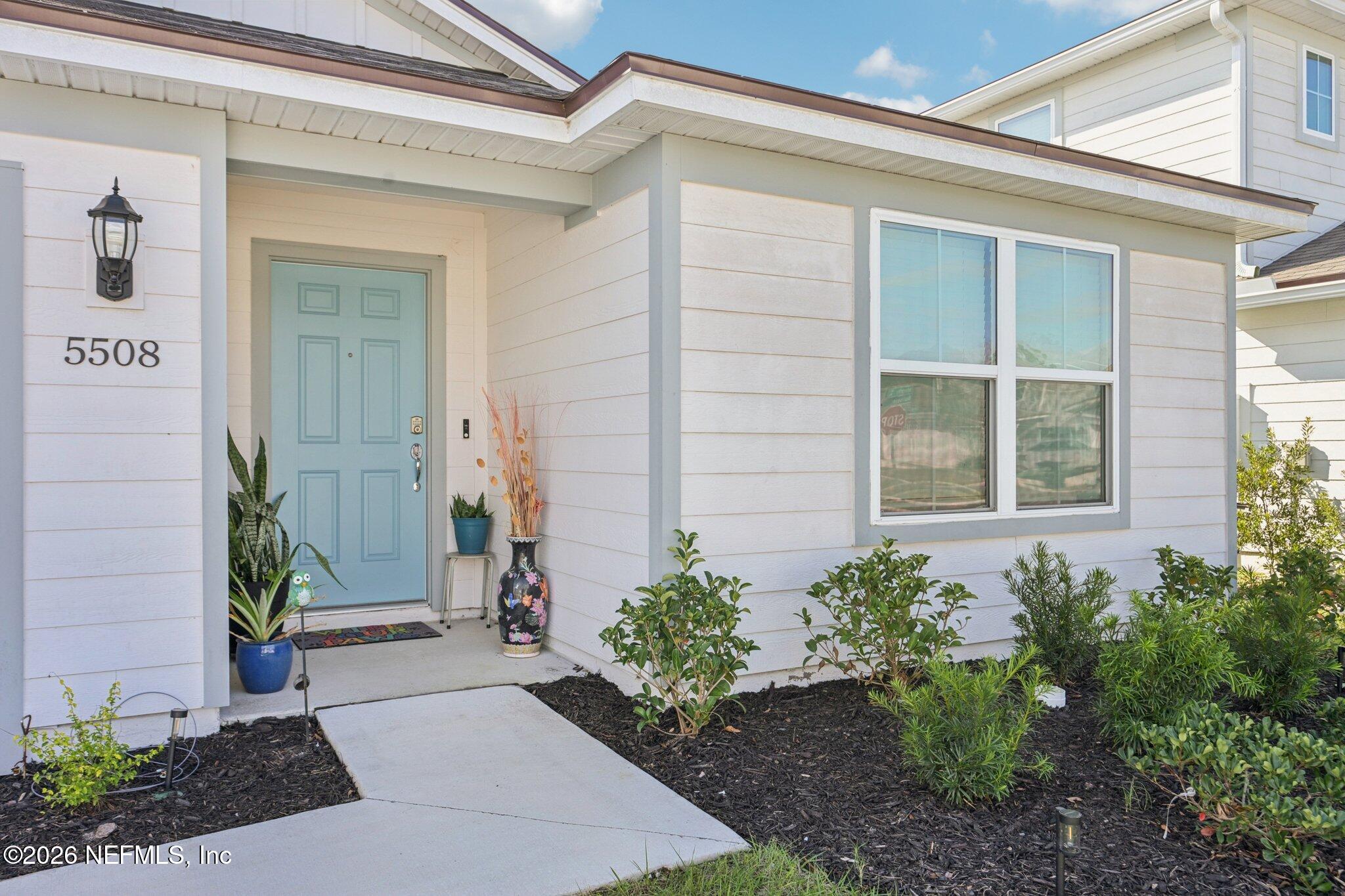 5508 Integrity Way Jacksonville, FL 32244 - Photo 4 of 34 a view of a pathway door of the house
